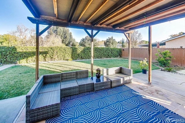 view of patio / terrace featuring an outdoor hangout area and a fenced backyard