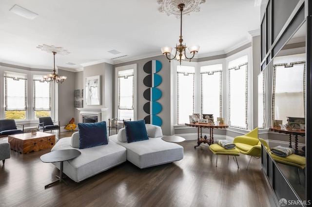 living room with plenty of natural light and a chandelier