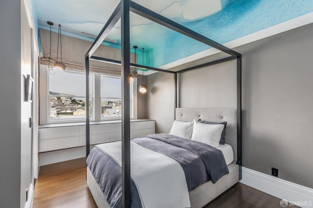 bedroom featuring hardwood / wood-style floors