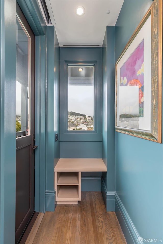 mudroom with dark hardwood / wood-style flooring