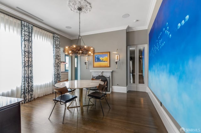 dining space featuring crown molding and dark hardwood / wood-style flooring