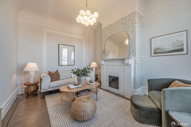 278 Whitney St, San Francisco, CA 94131 - living room featuring wood finished floors, a tile fireplace, and a chandelier