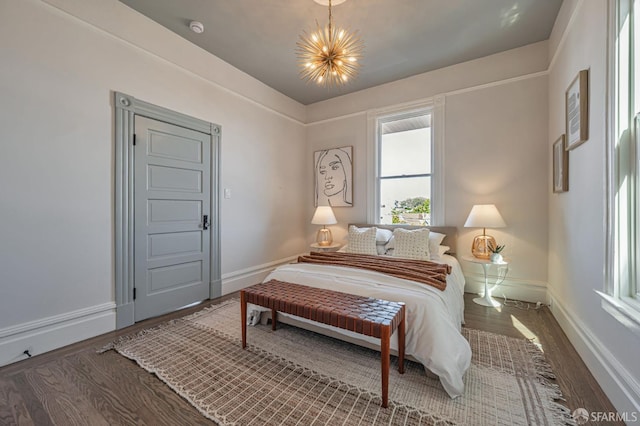278 Whitney St, San Francisco, CA 94131 - bedroom featuring wood finished floors and a chandelier