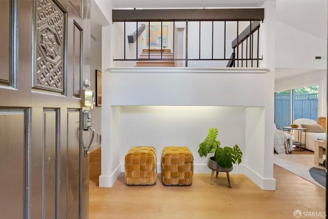 1945 Las Encinas Ct, Los Gatos, CA 95032 - sitting room featuring wood finished floors, a high ceiling, and stairs
