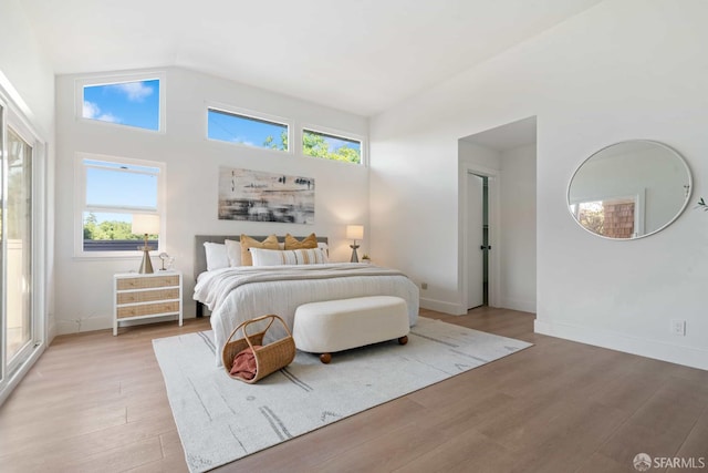 1945 Las Encinas Ct, Los Gatos, CA 95032 - bedroom featuring light wood-style floors and vaulted ceiling