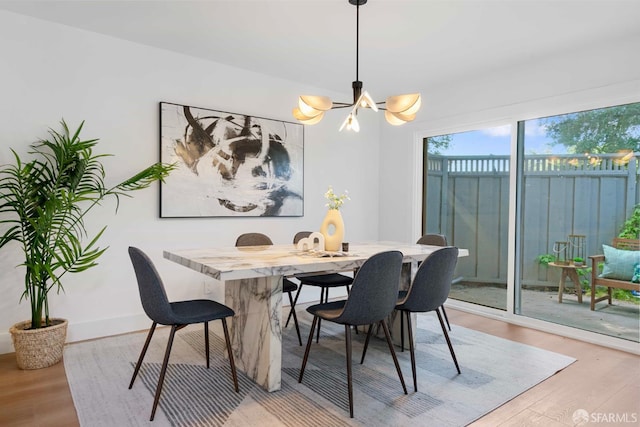 1945 Las Encinas Ct, Los Gatos, CA 95032 - dining area featuring light wood-style flooring and a chandelier