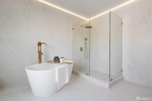 1945 Las Encinas Ct, Los Gatos, CA 95032 - bathroom with a walk in shower, a soaking tub, and tile patterned floors