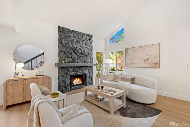 1945 Las Encinas Ct, Los Gatos, CA 95032 - living area with wood finished floors, high vaulted ceiling, and a fireplace