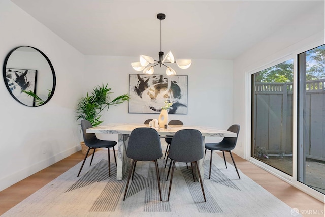 1945 Las Encinas Ct, Los Gatos, CA 95032 - dining area with a chandelier and light wood-style floors