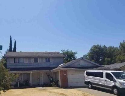 6028 Hollyhurst Way, Sacramento, CA 95823 - traditional-style house with a garage