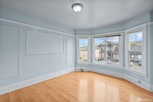 3328 San Jose Ave, Daly City, CA 94014 - spare room featuring baseboards and wood finished floors