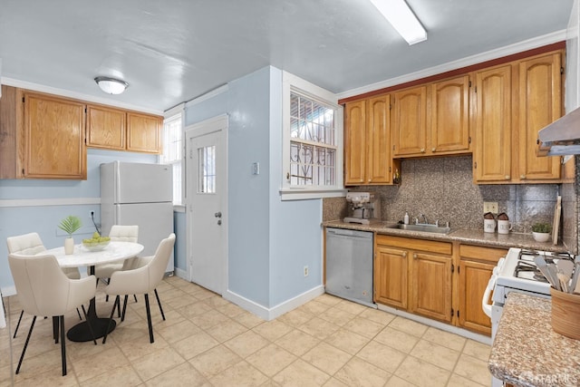 3328 San Jose Ave, Daly City, CA 94014 - kitchen featuring freestanding refrigerator, a sink, backsplash, and dishwasher