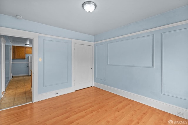 3328 San Jose Ave, Daly City, CA 94014 - unfurnished bedroom with baseboards and light wood-type flooring