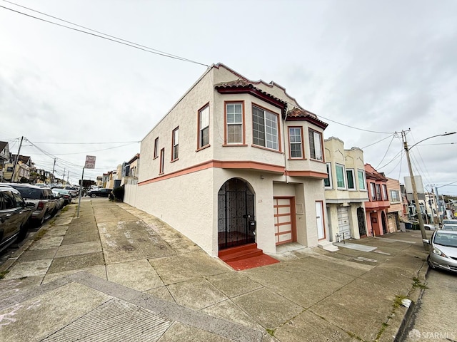 3328 San Jose Ave, Daly City, CA 94014 - exterior space with a tile roof and stucco siding