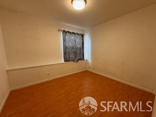3328 San Jose Ave, Daly City, CA 94014 - spare room with baseboards and wood finished floors