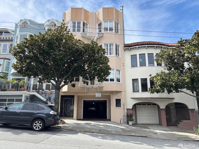 view of building exterior with an attached garage