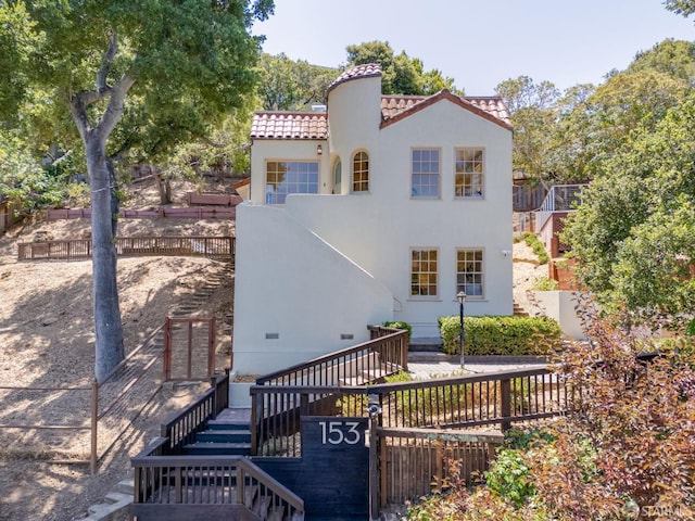 153 Dale Ave, San Carlos, CA 94070 - back of house with stairway, a tiled roof, and stucco siding