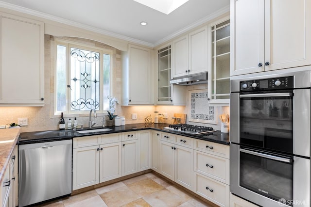 153 Dale Ave, San Carlos, CA 94070 - kitchen with stainless steel appliances, decorative backsplash, under cabinet range hood, glass insert cabinets, and recessed lighting