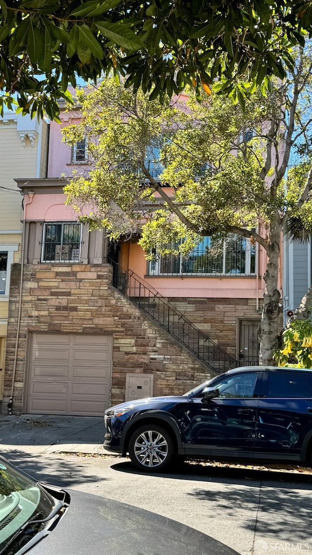 view of front of home with a garage