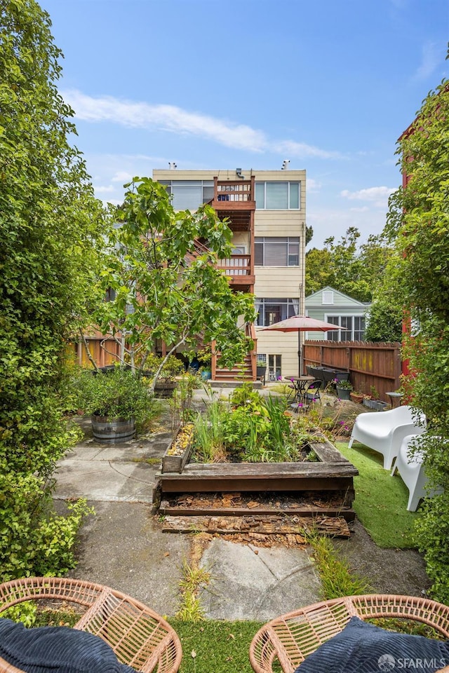 243 Henry St Unit A, San Francisco, CA 94114 - rear view of house with a vegetable garden