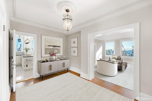 1800 Gough St Unit 7, San Francisco, CA 94109 - corridor featuring ornamental molding, wood finished floors, and a chandelier