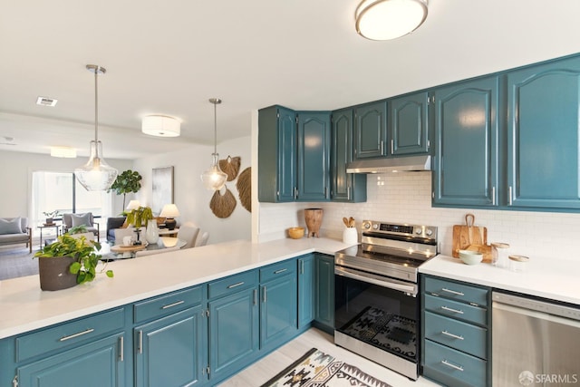 1278 La Playa St, San Francisco, CA 94122 - kitchen featuring appliances with stainless steel finishes, under cabinet range hood, backsplash, light countertops, and decorative light fixtures