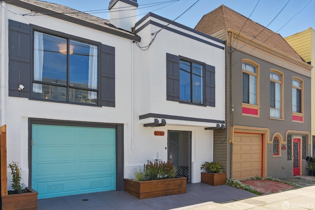 1278 La Playa St, San Francisco, CA 94122 - view of front of house featuring stucco siding and an attached garage