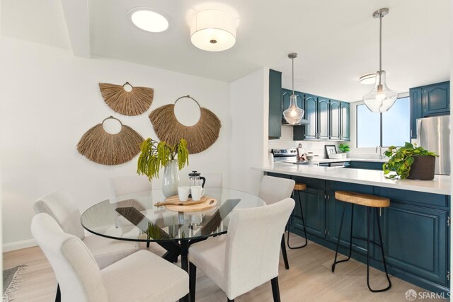 1278 La Playa St, San Francisco, CA 94122 - dining space with light wood-style flooring