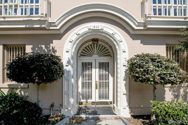 entrance to property featuring french doors