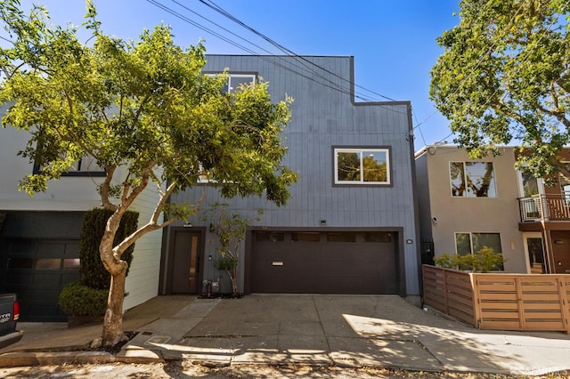 226 Rutledge St, San Francisco, CA 94110 - view of front facade with an attached garage and driveway