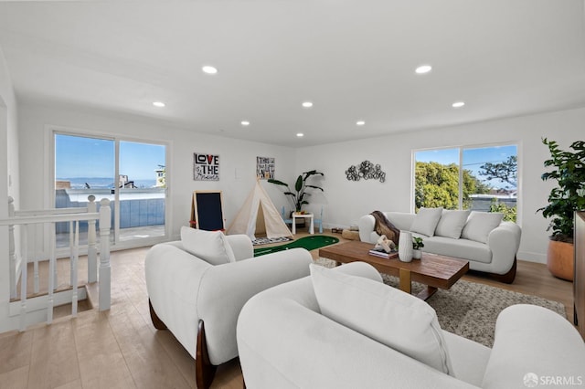 226 Rutledge St, San Francisco, CA 94110 - living room with recessed lighting, light wood-style flooring, and a water view