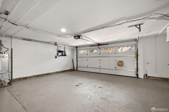 226 Rutledge St, San Francisco, CA 94110 - garage with a garage door opener, water heater, and baseboards