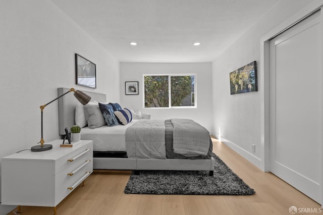 226 Rutledge St, San Francisco, CA 94110 - bedroom featuring light wood-type flooring, recessed lighting, and baseboards
