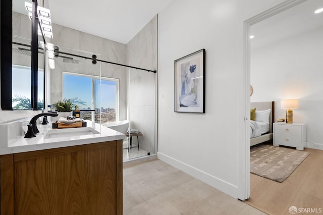 226 Rutledge St, San Francisco, CA 94110 - ensuite bathroom with vanity, a walk in shower, and baseboards