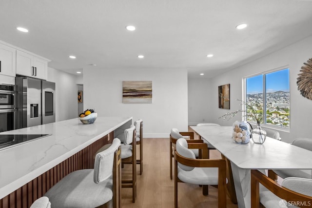 226 Rutledge St, San Francisco, CA 94110 - dining space featuring recessed lighting, light wood finished floors, and baseboards