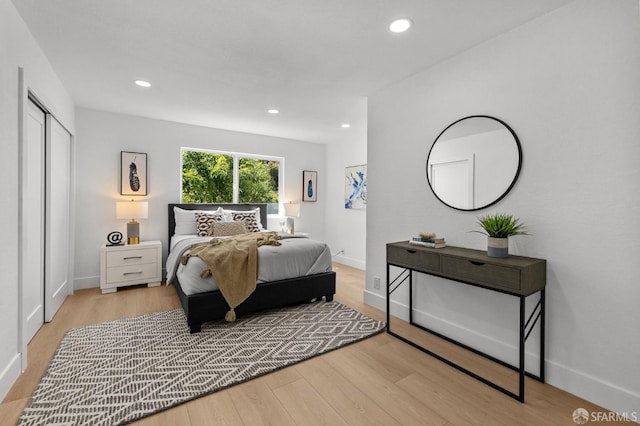 226 Rutledge St, San Francisco, CA 94110 - bedroom with light wood finished floors, recessed lighting, baseboards, and a closet