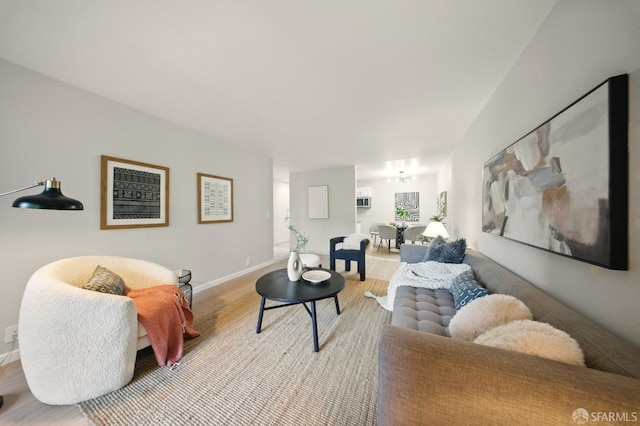 16006 E 14th St Unit 101, San Leandro, CA 94578 - living area featuring light wood-type flooring and baseboards