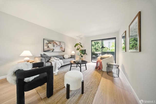 16006 E 14th St Unit 101, San Leandro, CA 94578 - living area featuring wood finished floors and baseboards