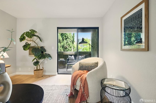 16006 E 14th St Unit 101, San Leandro, CA 94578 - living area with wood finished floors and baseboards