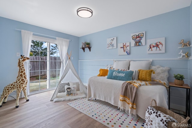 bedroom with wood finished floors