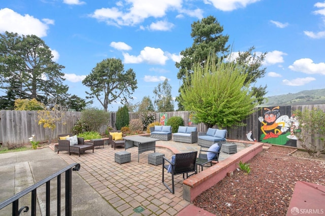 view of patio / terrace with a fenced backyard and an outdoor hangout area