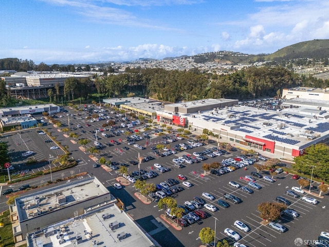 birds eye view of property with a mountain view