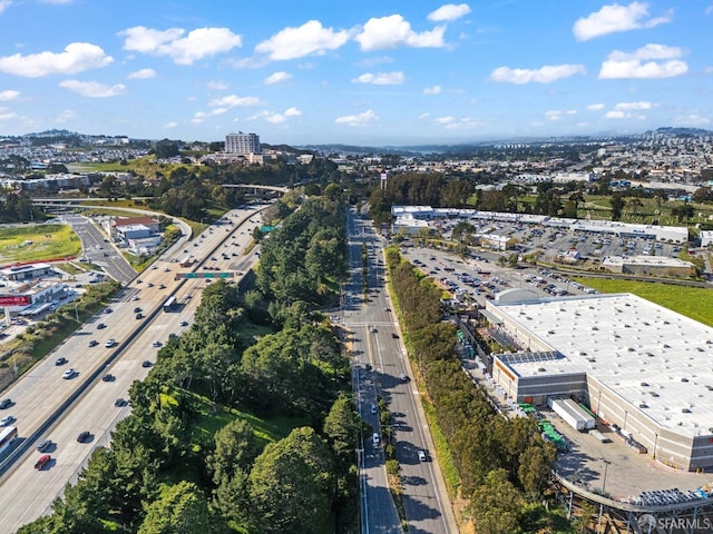 birds eye view of property featuring a city view