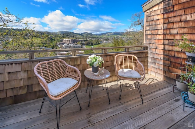 balcony featuring a mountain view