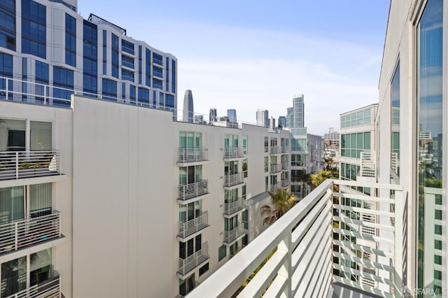 balcony featuring a view of city