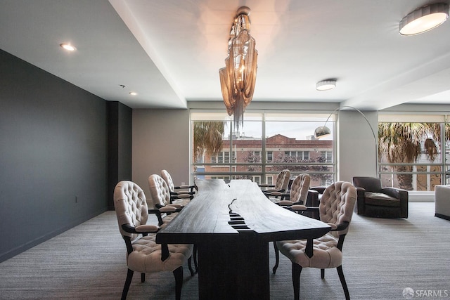 dining room featuring carpet flooring and recessed lighting