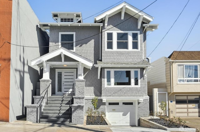 view of front of home featuring driveway and an attached garage