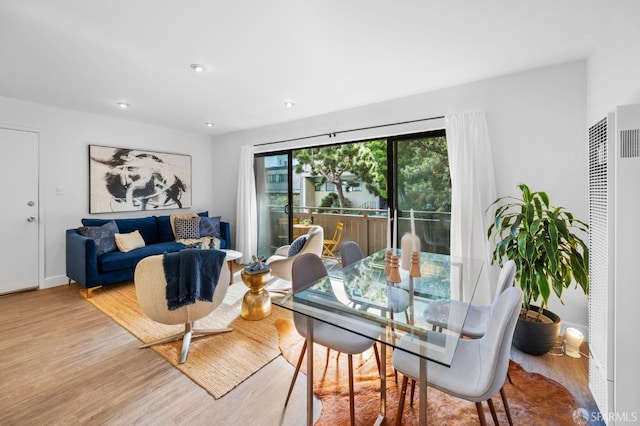 dining area with light wood-type flooring