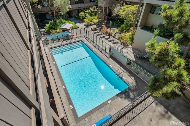 view of swimming pool featuring a patio