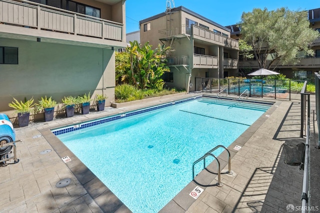 view of pool with a patio